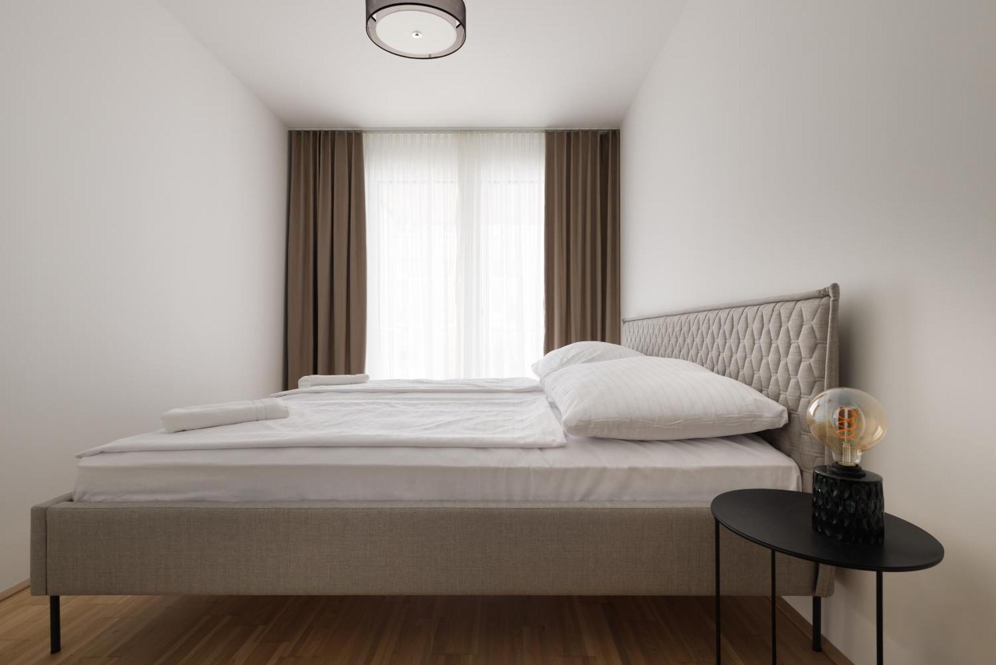 Coho City Apartments Mit Hauseigener Tiefgarage Wenen Buitenkant foto